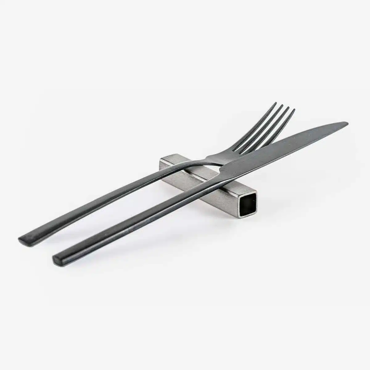 Glazed stainless steel cutlery rest
